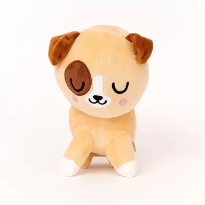 Pelúcia de cão castanho e branco sentado
