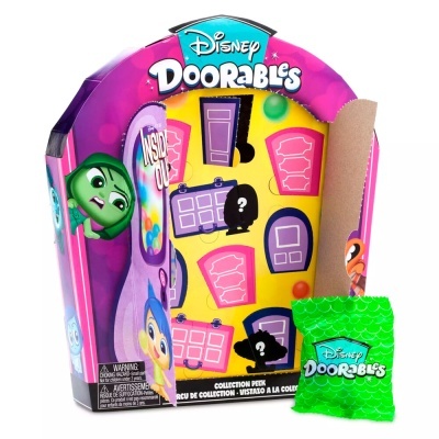 Embalaem do produto Disney Doorables com pacote verde bolha ao lado