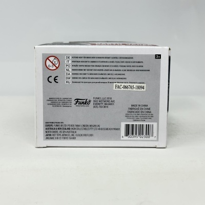 Detalhe da parte traseira da embalagem de um produto Funko com texto e código de barras.