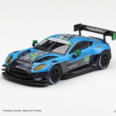 Miniatura de carro de corrida azul e preto com número 44 e texto Magnus
