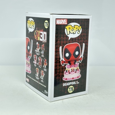 Caixa de brinquedo Funko Pop! Deadpool em bolo com cores vermelha e preta
