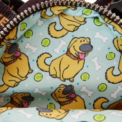 Interior de bolsa com padrão de cães caricaturados, ossos e bolas