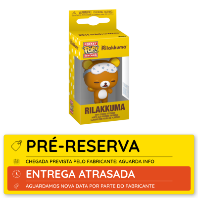 Chaveiro de figura em vinil Rilakkuma na embalagem amarela com texto e padrão de bolinhas