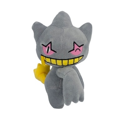 Pelúcia cinzenta com rosto sorridente e uma mão amarela levantada