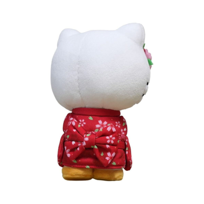 Boneco de pelúcia branco vestido com roupa vermelha floral e laço nas costas