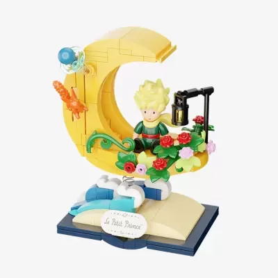 Figura de lego Le Petit Prince na lua amarela com flores e candeeiro