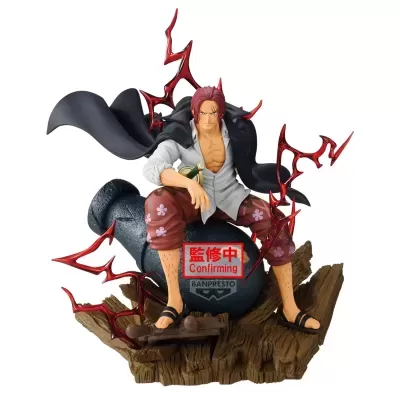 Figura de personagem anime com capa preta e calças castanhas sentado numa esfera preta sobre base castanha.