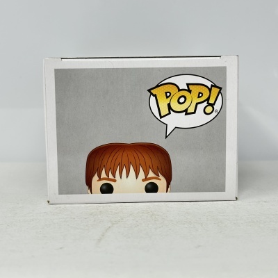 Caixa branca de Funko Pop com personagem e balão POP!