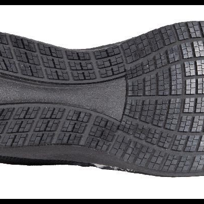 Sola de sapato preta em borracha com padrão antiderrapante