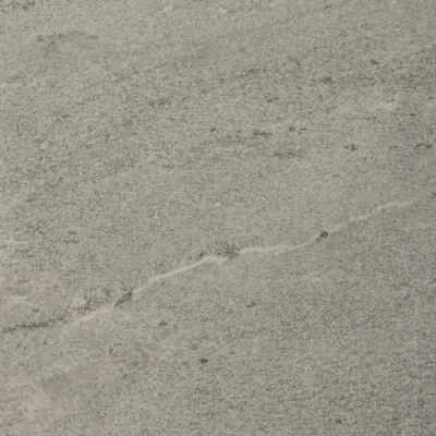 Superfície rugosa cinzenta com fissura diagonal clara