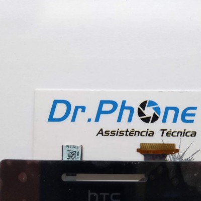 Componente eletrônico preto sobre cartão Dr.Phone