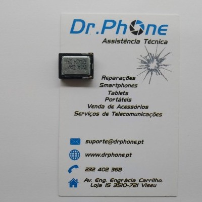 Componente eletrónico retangular sobre cartão de visita da Dr.Phone