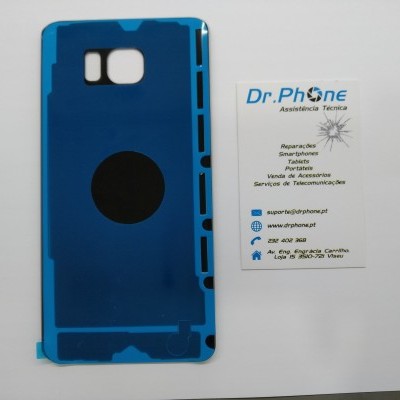 Adesivo azul para telemóvel ao lado de cartão de visita da empresa Dr.Phone sobre fundo branco