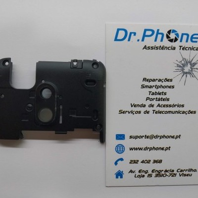 Componente plástico preto ao lado de cartão de visita DR.PHONE