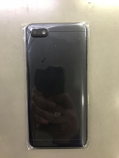 Smartphone Xiaomi preto embalada em saco plástico