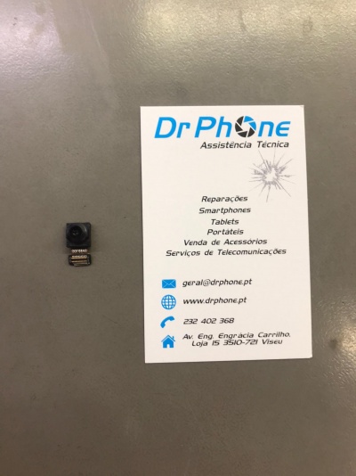 Câmara pequena para smartphone e cartão de visita da Dr Phone Assistência Técnica em superfície cinzenta