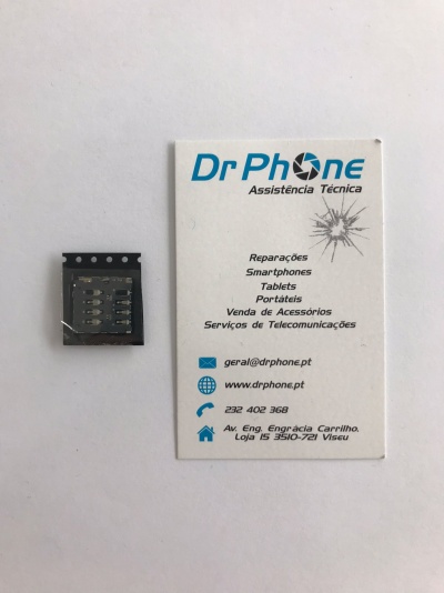 Leitor de cartão SIM preto ao lado de cartão de visita branco da Dr Phone com texto e logotipo