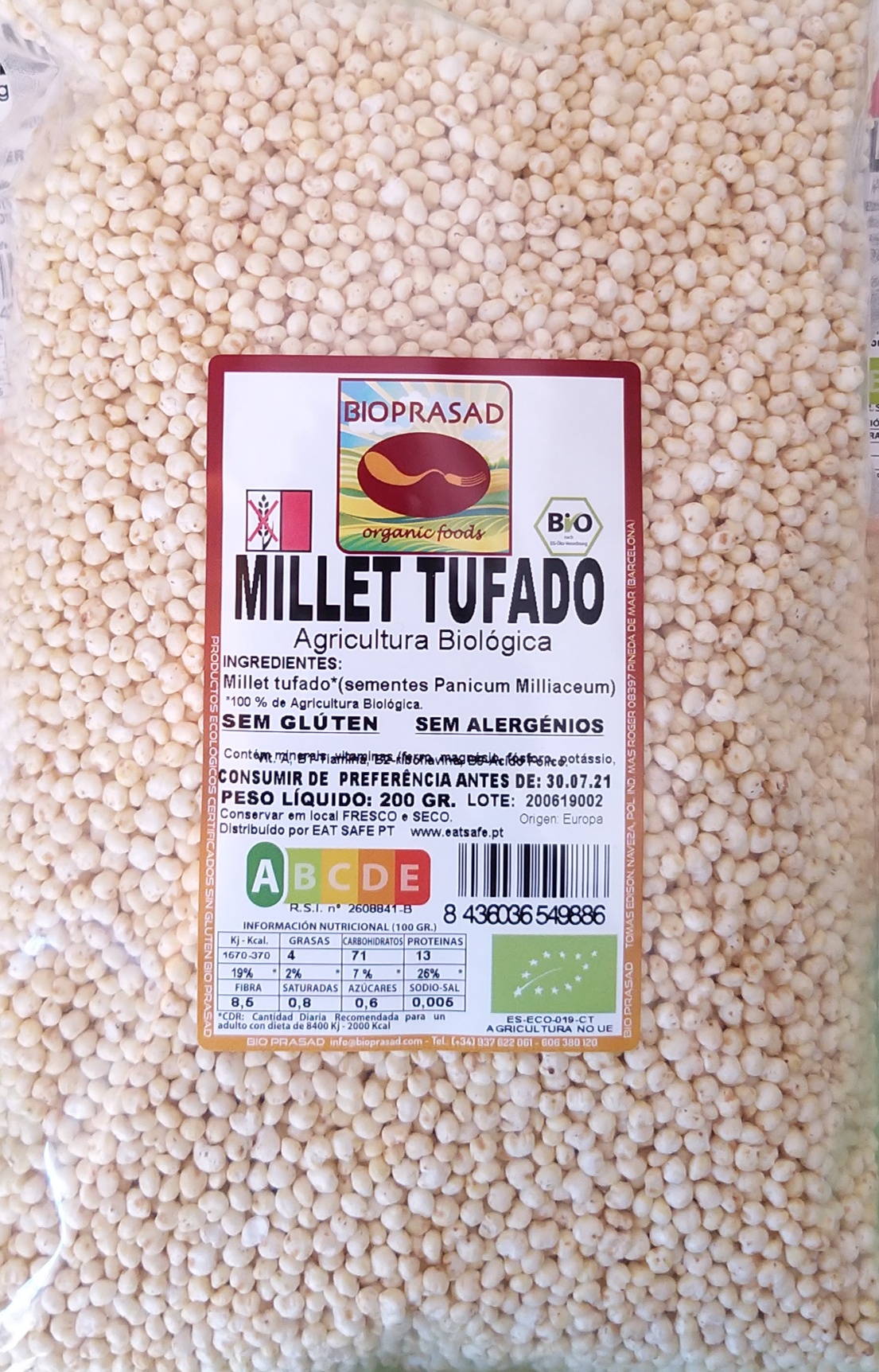Millet tufado 100g #Bioprasad sem glúten Pacote transparente com millet tufado e etiqueta da marca BIOPRASAD