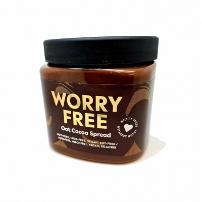 Frasco de creme para barrar de aveia e cacau com rótulo castanho e texto dourado