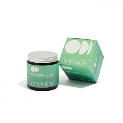 Frasco e caixa do After Sun Milk ODYSKIN com rótulo verde claro