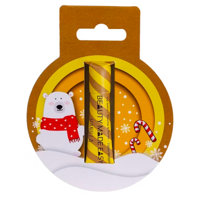 Bálsamo labial amarelo com embalagem circular decorada com urso polar e bengalinhas de doces