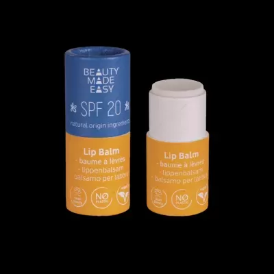 bálsamo labial em stick com embalagem azul e amarela