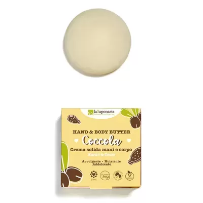 Manteiga sólida para mãos e corpo Coccolà em embalagem amarela e produto redondo creme