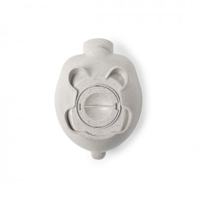 Peça oval de plástico cinzento com área central circular e relevos em forma de pétalas