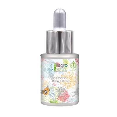 Frasco de soro facial anti-idade com conta-gotas e padrão floral colorido