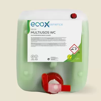 Recipiente de plástico verde claro com torneira vermelha e rótulo do produto multiusos para WC