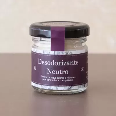 Frasco de vidro com desodorizante neutro e rótulo roxo