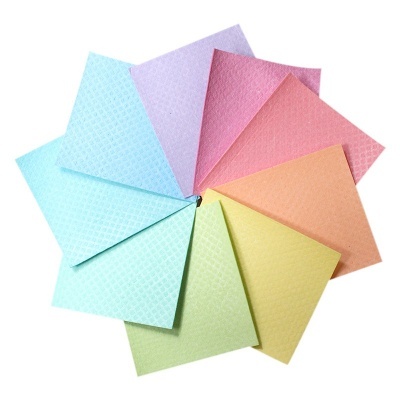 Panosen microfibra coloridos dispostos em círculo, cores pastel variadas com textura em relevo.