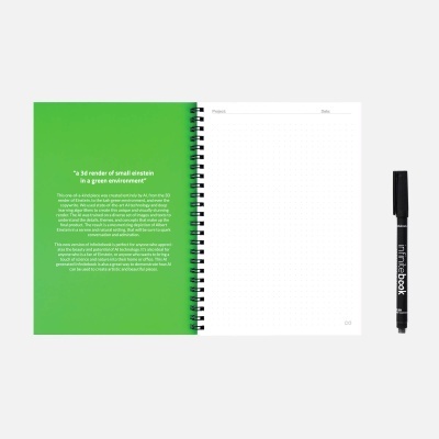 caderno verde e branco aberto com caneta preta ao lado
