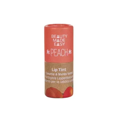 Bálsamo labial Lip Tint Peach da BEAUTY MADE EASY em embalagem cilíndrica cor de pêssego e castanho.