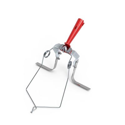 Ferramenta metálica com pega vermelha e mola para agarrar objetos