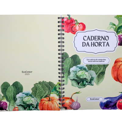 Caderno espiral com ilustrações de vegetais e título 'CADERNO DA HORTA'