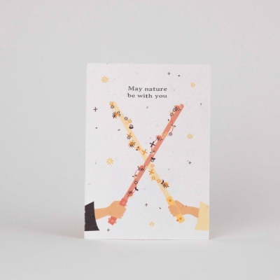 Cartão branco com texto e ilustração de varinhas com flores