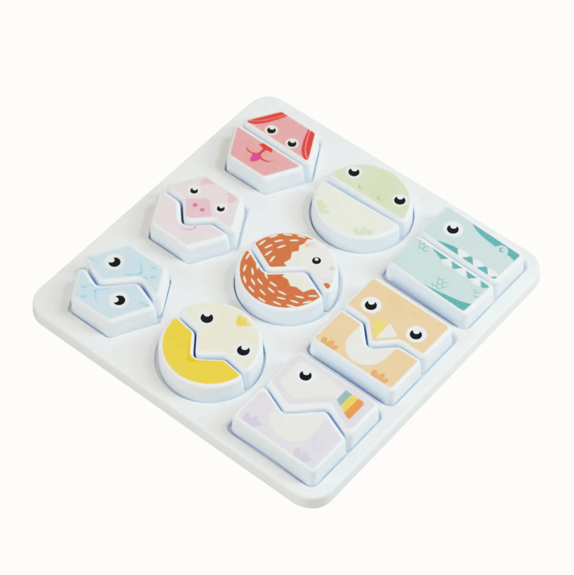 Childrens animal-shaped puzzle pieces in a white tray
