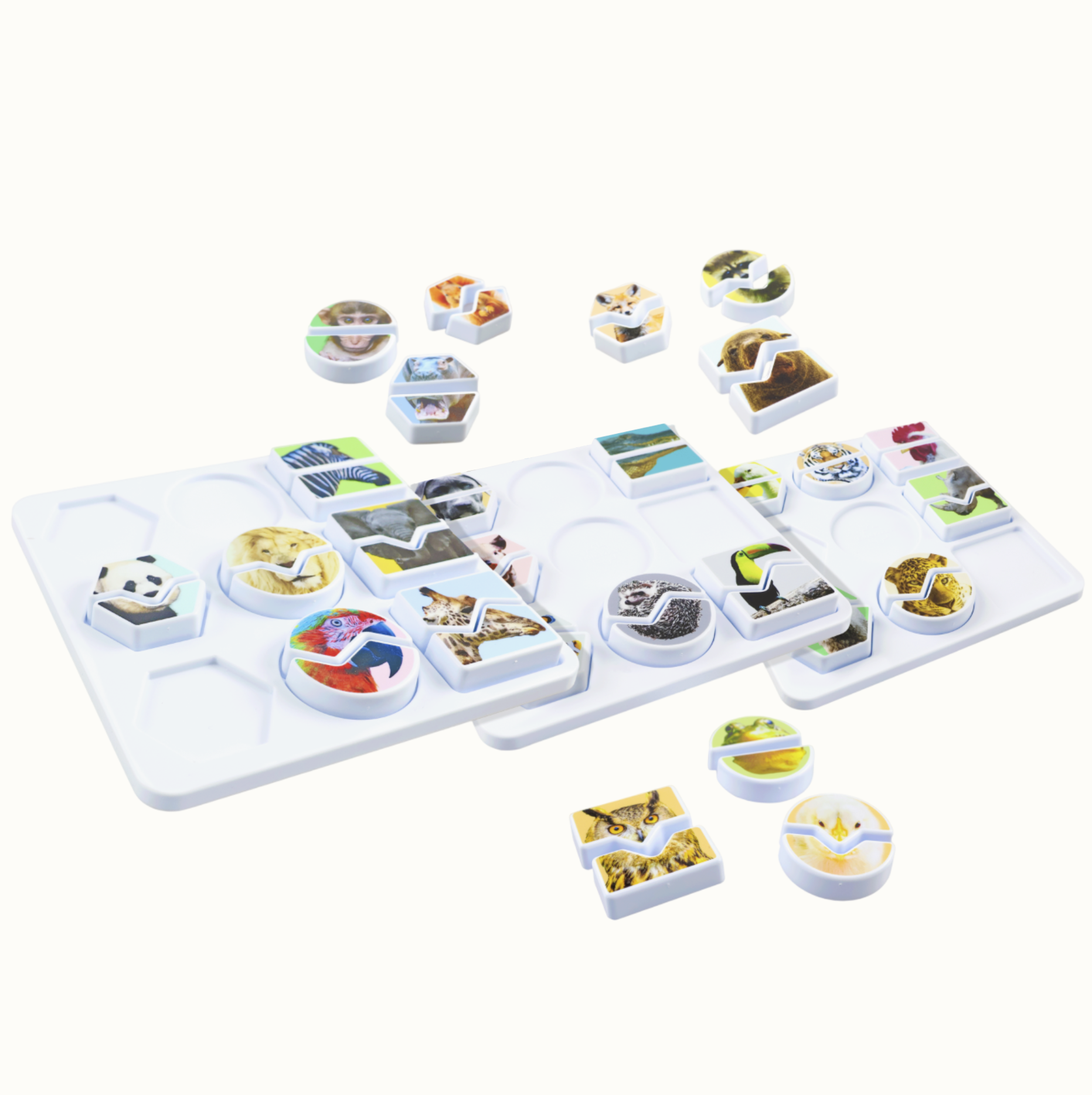 Animal-themed puzzle pieces on a white plastic tray