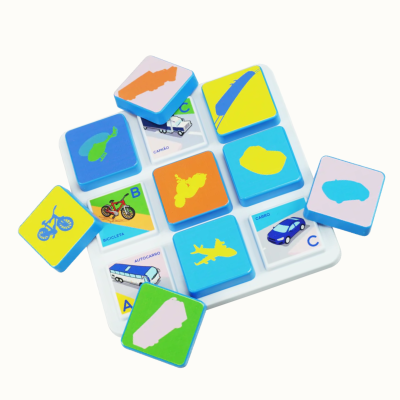 Colorful childrens puzzle pieces with vehicle images and names on a white tray
