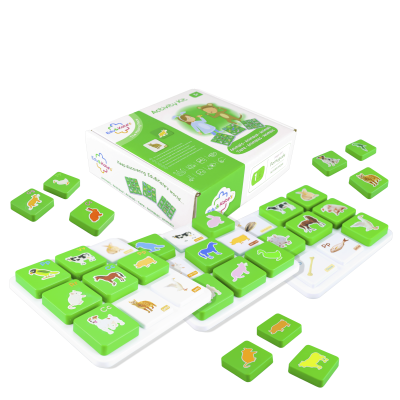 Childrens educational activity kit with green and white animal tiles and box