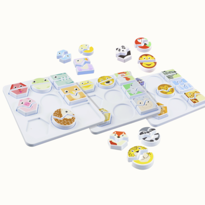 Childrens animal matching puzzle set with colorful animal pieces on a white tray