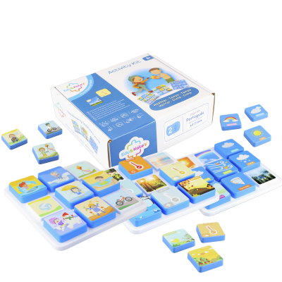 Educational activity kit with weather-themed tiles and blue and white box