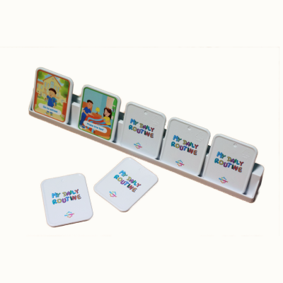 Set of daily routine cards with illustrations and a white stand