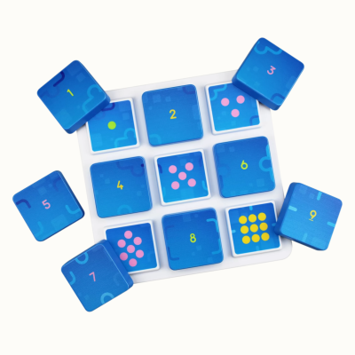 Blue and white numbered puzzle game tiles in white plastic frame