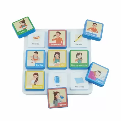 Childrens educational matching game blocks with Portuguese words and illustrations on white board