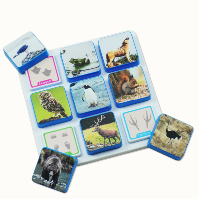 Animal puzzle pieces with blue edges showing various animal photos and some labeled with names