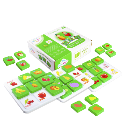 Educational fruit matching activity kit with green and white tiles and packaging