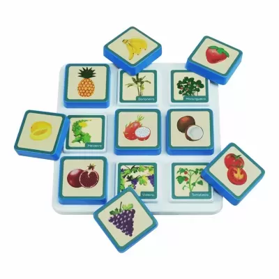 Blue-bordered square tiles with fruit and plant illustrations in a white tray