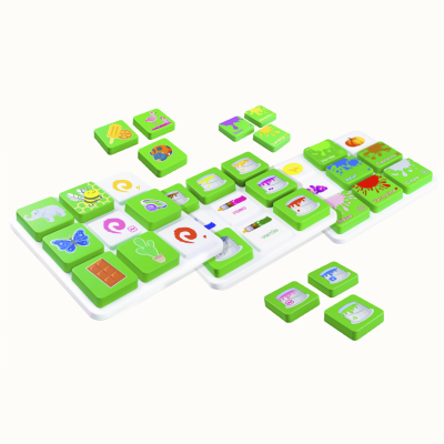 Educational game tiles with colors and images on white trays